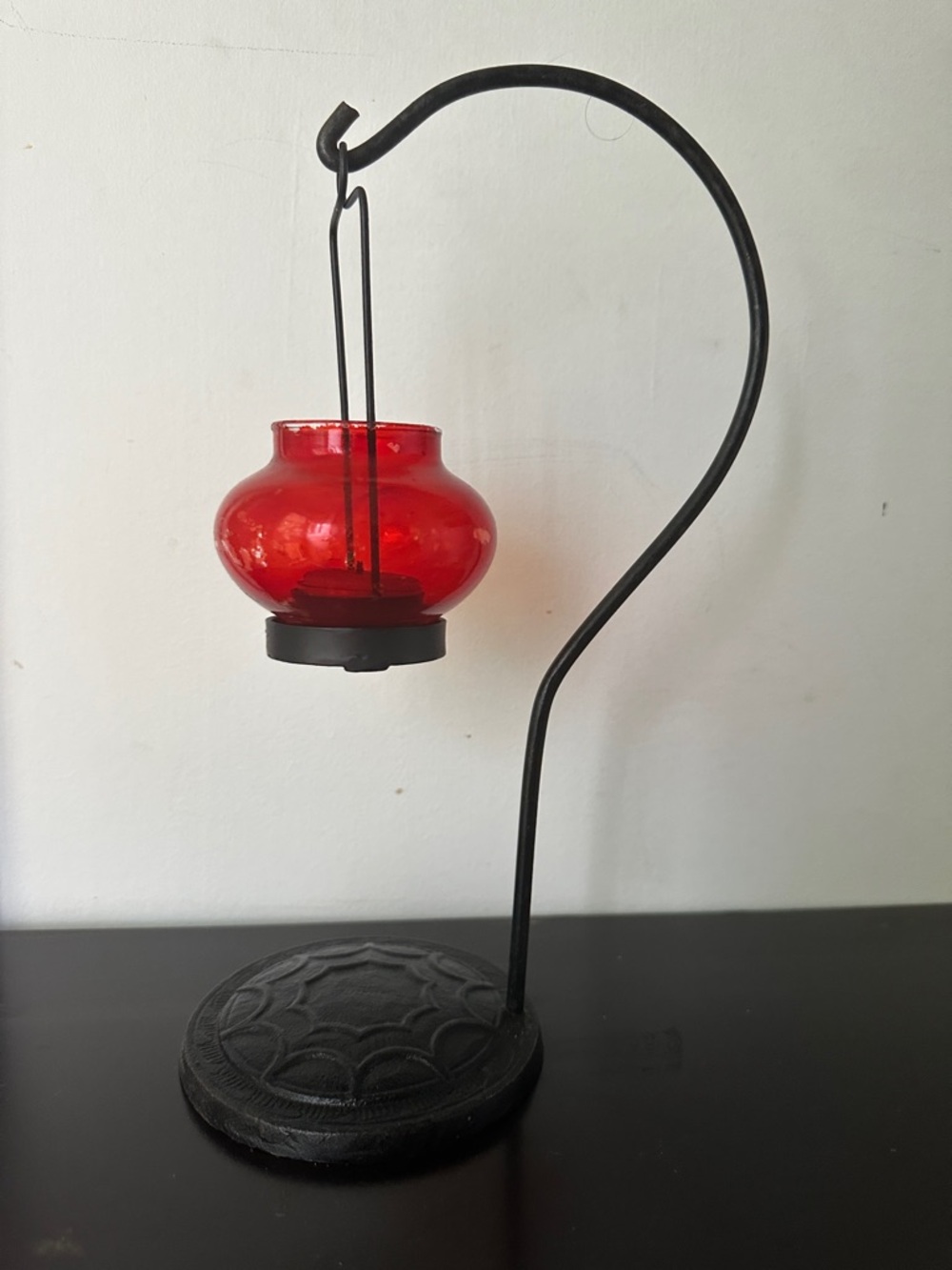 Red Glass Hanging Candle Holder on Black Metal Stand